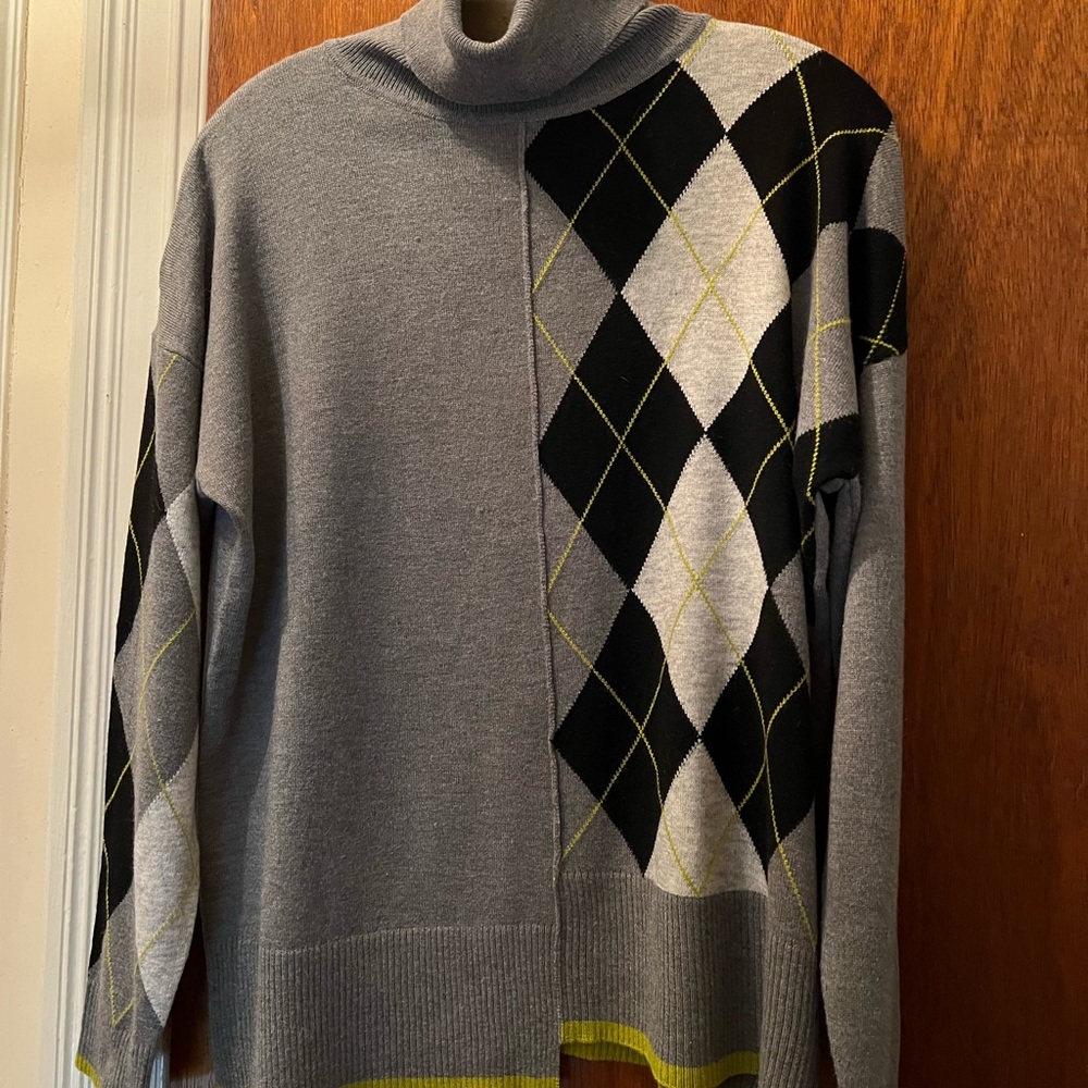 Uniquely patterned color block turtleneck sweater